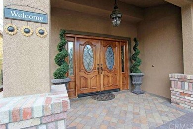 Upgraded double doors accent the front entry.