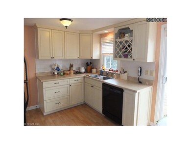 Remodeled kitchen with new cabinets, updated appli