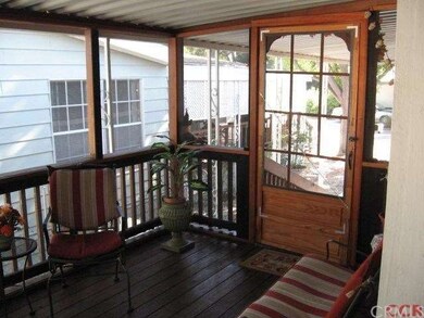 Screen in porch. Redwood decking.