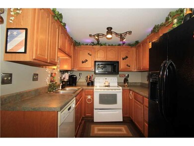 Kitchen. The galley kitchen is nicely updated with