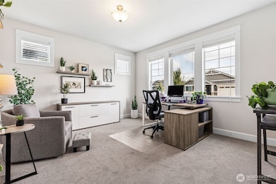 Front guest room has a walk in closet and  also makes a great space for an office.