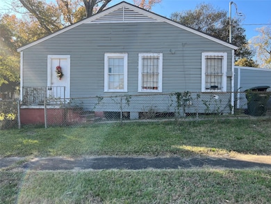 View of home's exterior with a yard
