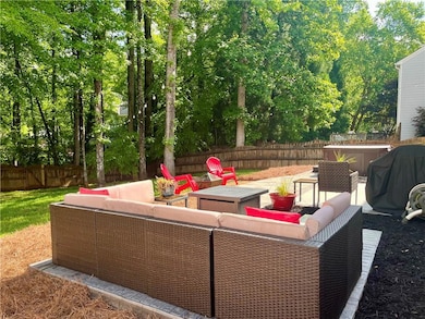 View of patio featuring a fenced backyard, an outd