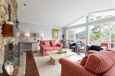 Lakefront Living Room with gas logs and stone fire