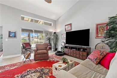 Living room featuring tile patterned floors and hi