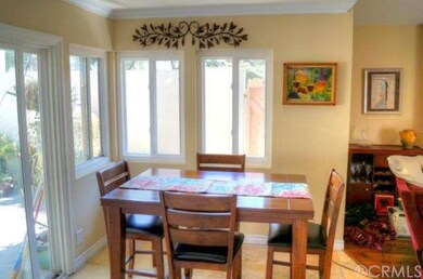 Dining area. Sliding glass doors to the patio on t