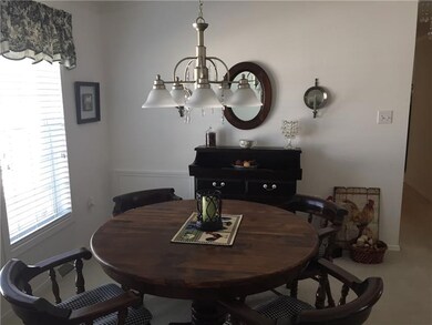 Diningroom is open to the kitchen for conversation