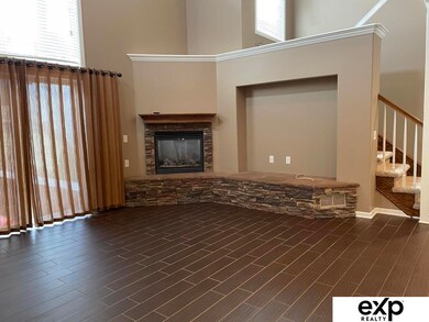 Vaulted Ceilings, Stone Gas Fireplace, High Windows, Ceramic Wood Tile Floors