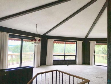 VAULTED CEILINGS, OPEN FLOOR PLAN, DECK ACCESS