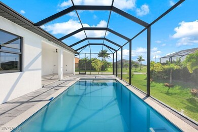 View of pool featuring a lawn, a patio, ceiling fa