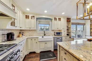 6 burner stove, custom range hood, in-lay doors, f