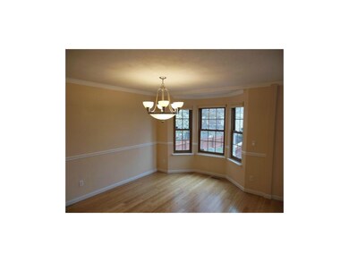 Open Dining Rm with Gorgeous Floors, updated light