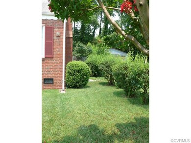 Beautifully landscaped side yard.