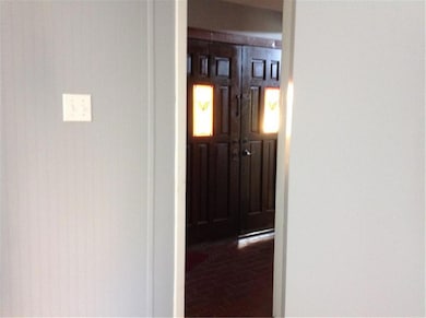 dining area behind the front door