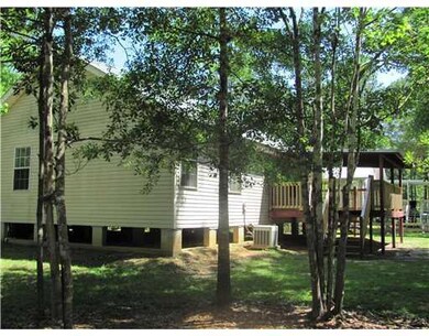 Backyard. Lots of oak trees on the lot.  18x14 foo
