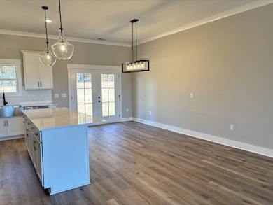 You have plenty of room in the dining room for a large table - necessary for family dinners and entertaining.