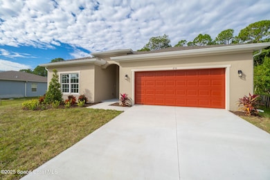 874 Cornelia Ave SE, Palm Bay, FL 32909 - photo 5