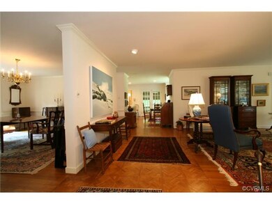 View from entrance hall. Teak parquet flooring run