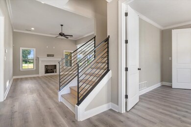 LVP Wood Floors throughout, Iron Rails, Wood-Tread