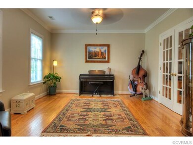 Living Room to the left of the foyer. French doors