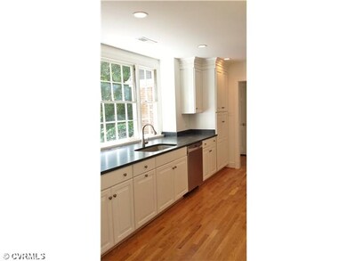 Kitchen - Expansive countertops and large bright w
