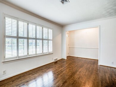 Entrance opens to living, dining, den and kitchen 