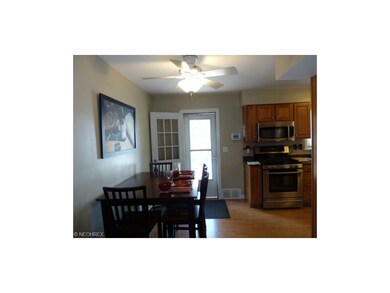 Dinette  Update Kitchen/Dinette, lighted ceiling paddle fan, replacement steel window exterior door, laminated flooring, security system