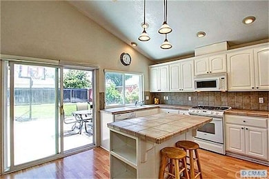 Island breakfast area. Lots of cabinets.
