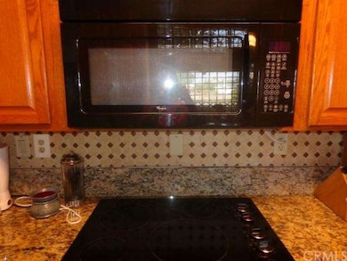 Electric cooktop and built in microwave
