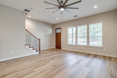 Entrance foyer featuring ceiling fan, a healthy am