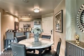 Dining room featuring baseboards