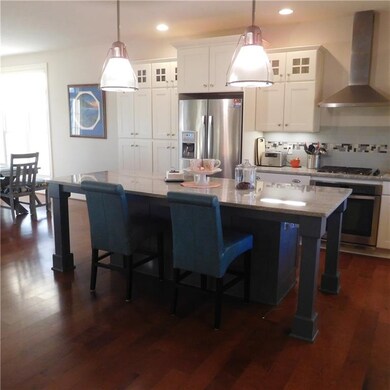 A large island and plenty of cupboard space.