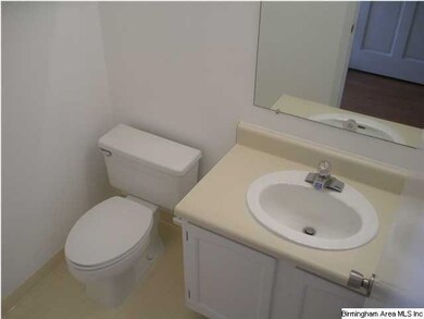 The half bath very near the front door and out of 