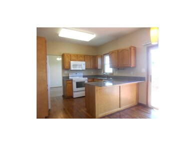 Kitchen. New quartz counters, wood floor