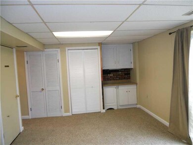 Family Room. The addition of cabinets, countertop,