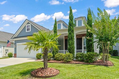 View of front of property with a garage and a fron