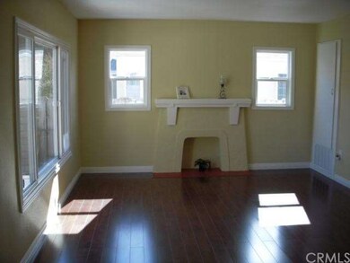 Main living room with a nice fireplace and plenty 