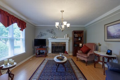 This lovely living room has a large picture window and fireplace! 2221 Red Mile Rd, Murfreesboro, TN 37130