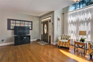 Main Living area depicting front door.