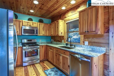Updated kitchen with granite countertops, stainles