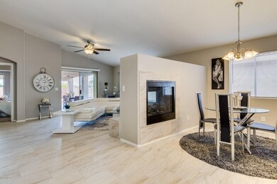 Dining Area with See-Through Fireplace