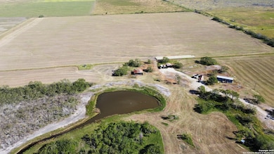 *50 acres of pasture back of MH and cross fenced