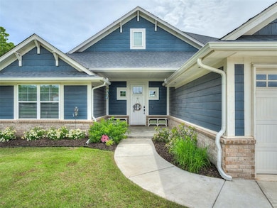View of front facade featuring a front yard, a shi