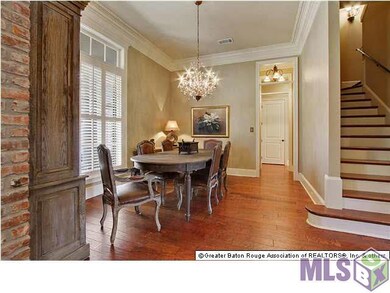 Formal dining area off of kitchen and wet bar.