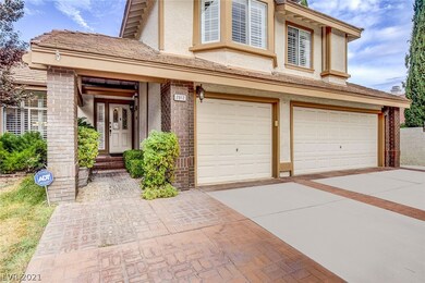 Covered front walkway and entry, 3 car garage with
