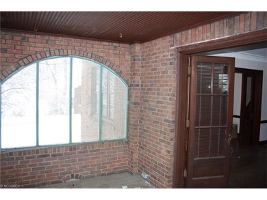 Side porch off Living room accessed through French