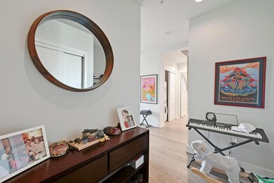 Hall with light wood-type flooring