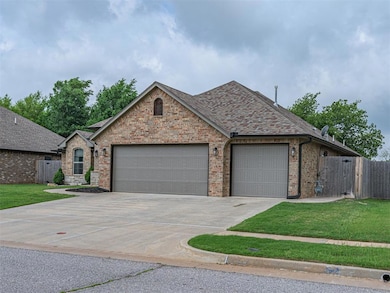 Ranch-style home with an attached garage, driveway, brick siding, and roof with shingles