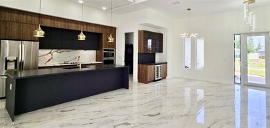 Kitchen with stainless steel appliances, wine cool