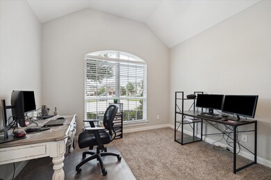 Spacious study is private with French door entry.